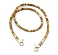 Detail of colorful disc bead strap with golden metal lobster clasps for bags or phones - 80 cm / Mustard Brown (Gold Buckle)