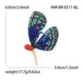 Broche de mariposa colorido con pedrería vibrante y dimensiones detalladas - Azul
