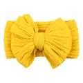 Bright yellow elastic jacquard headband for babies with a large knitted bow detail - Yellow
