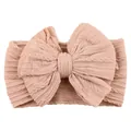 Soft matte nude pink jacquard baby headband with large bow and elastic knit texture - Blush Pink