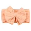 Elastic baby headband with large jacquard bow in soft apricot color for infants - Pale Green