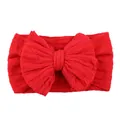 Vibrant red wide cable-knit baby headband featuring a large matching bow decoration - Red