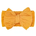 Elastic baby headband in bright orange jacquard knit with a large bow detail - Orange