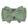Elastic sage green cable knit baby headband with a large decorative bow - Bean Green