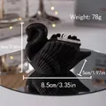 Elegant black swan scented candle with matte finish and detailed feather texture for decor - Black Swan