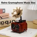 Vintage phonogram music box with red wood grain texture and gold flower horn - Hand-crank Gramophone Style (Brown)
