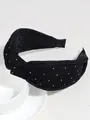 Elegant black knitted headband with sparkling silver dots and a knotted top design - Corduroy Black With Rhinestones
