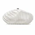Detail view of pearl white acrylic clutch bag with wave texture and silver metal clasp - White
