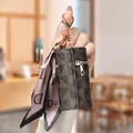 Mini dark brown monogram cylindrical coin purse with lavender scarf and gold clip - Dark Brown Monogram (M Pattern) / Tan