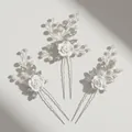 Driedelige bruidshaarspeldset met witte keramische bloemen, parels en zilveren accenten - Rozen haarspeldset / Wit