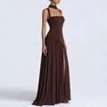 Detail view of chocolate brown halter neck maxi dress with side slit and pleated skirt - Brown (30612)