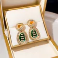 Vintage pearl star earrings in gold with orange and green enamel detailing - Retro Hammered Double Segment Pendant (E1812-3)