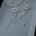 Elegant silver tassel earrings with white pearls and sparkling rhinestone star cluster - Star Cluster Rhinestone Pearl Tassel Style (E5909) / Silver
