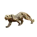 Dettaglio di una statuetta di leopardo in ottone vintage in potente posa da corsa - Leopardo in Cammino