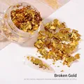 Irregular gold foil flakes for nail art and cake decoration in a round plastic container - Gold Flakes