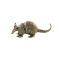 Detailed macro view of vintage brass pangolin figurine with intricate scale texture - Armadillo