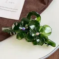 Elegante pinza per capelli a fiore verde scuro in acetato con strass iridescenti - Grande / Verde Scuro