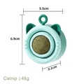 Cat ear shaped rotating catnip ball toy in light green plastic finish with dimensions - Blue - Catnip Style