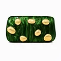 Detailed macro view of green marble acrylic clutch with gold pebble ornaments - Green