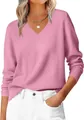 Detail of ribbed V-neckline and textured knit fabric on pink long sleeve sweater - S / Pink