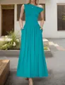 Detail of elegant teal one-shoulder maxi dress with side pockets and pleated flowy hem - Lake Blue
