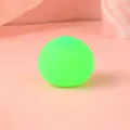 Macro detail of a fluorescent green maltose squeeze ball with a matte translucent texture - 4cm / Green