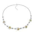 Macro view of adjustable silver steel chain with yellow cat eye beads and lobster clasp - Amber Cat Eye Necklace