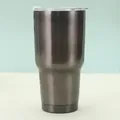 Close-up of 30oz dark grey brushed stainless steel tumbler with clear lid and leak-proof seal - Steel Color