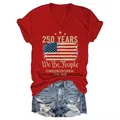Red V-neck t-shirt with USA 250th anniversary print and denim shorts on white background - S / Tops / Red