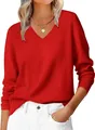 Close-up of ribbed cuffs and V-neckline texture on a classic red knit sweater - S / Red