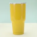 Close-up of lemon yellow 30oz stainless steel tumbler with tapered bottom for car holder - Yellow