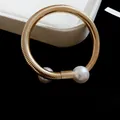 Golden geometric textured open bangle with dual large white pearls in luxe finish - Snake Bone Double Pearl Cuff (22#)