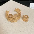 Golden hollow floral cuff bracelet and matching ring set with textured surface - Butterfly Style Bangle and Ring Set (40#) / Gold