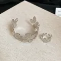 Silver metal bangle and ring set featuring radial texture and elegant floral design - Flower Bracelet and Ring Set (37#) / Silver