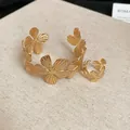 Golden floral textured cuff bracelet and adjustable ring set with radial striped pattern - Multi-Layer Floral Bracelet and Ring Set (36#) / Gold