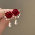 Elegant gold flower earrings with red velvet rose petals and hanging teardrop pearl - Red Velvet Rose Teardrop Artificial Pearl Studs