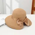 Elegant beige straw sun hat with silk ribbon and pearl-encrusted bow detailing - Sixteen Pearl Khaki