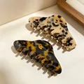 Elegant tortoise shell acetate hair claws in beige and dark amber patterns - Regular Amber Leopard Shark Clip