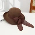 Women wide brim sun hat in coffee brown with bow ribbon on a white background - Hollowed-out Coffee