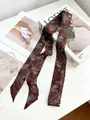 Dark brown silk skinny scarf with floral paisley pattern and pointed ends - Textured Vine