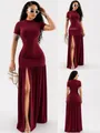 Detailed view of women's burgundy maxi dress with side slit and pleated texture - Dark Red