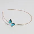 Serre-tête fin doré orné d'un papillon turquoise en cristaux gouttes et petits brillants - Papillon Bleu