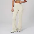 High-waisted flared yoga pants in creamy white featuring high-stretch fabric for fitness - S / Beige