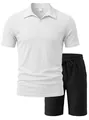 Close-up of breathable textured jacquard fabric and collar labels on men's sport set - White and Black