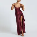 Detail of burgundy satin dress with thin straps, ruched waist and side slit with ruffles - Burgundy