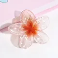 Molla per capelli a forma di fiore di frangipane sfumato arancione in resina - Motivo a Fiocco di Neve Arancione