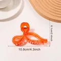Translucent orange bow hair claw clip for women, size 4.3 inch with metal spring - Orange Red Transparent