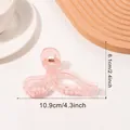 Translucent light pink bow hair claw clip in 4.3 inch size for elegant hairstyling - Jelly Pink