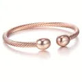 Elegant rose gold cable open cuff bracelet featuring polished beads on a white background - Rose Gold