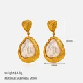 Gold plated stainless steel drop earrings with irregular pearls and hammered texture - Gold Hammered Teardrop Pearl Drop Earrings